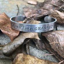 Load image into Gallery viewer, aluminum bracelet with permission granted hand stamped on it. 
